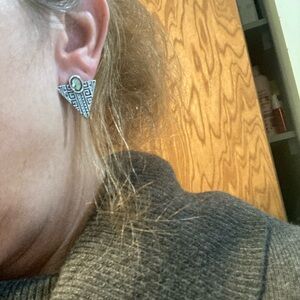 Silvertoned geometric earrings with yellow green colored stone